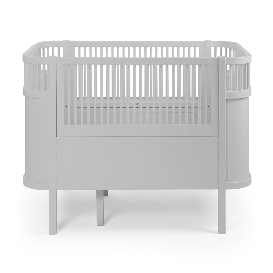 Luxury Sebra baby and junior cot bed in stone grey, premium handcrafted beech wood, adjustable height, stylish Nordic design by Ella James at brixbailey.com
