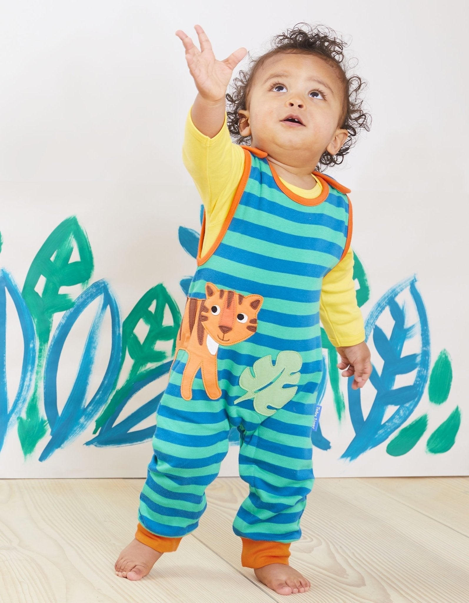 Premium Striped Green Baby Onesie with Adorable Tiger Applique - 100% Organic Cotton, Snap Buttons for Easy Diaper Changes, Eco-Friendly Dye, Machine Washable by Toby Tiger at brixbailey.com