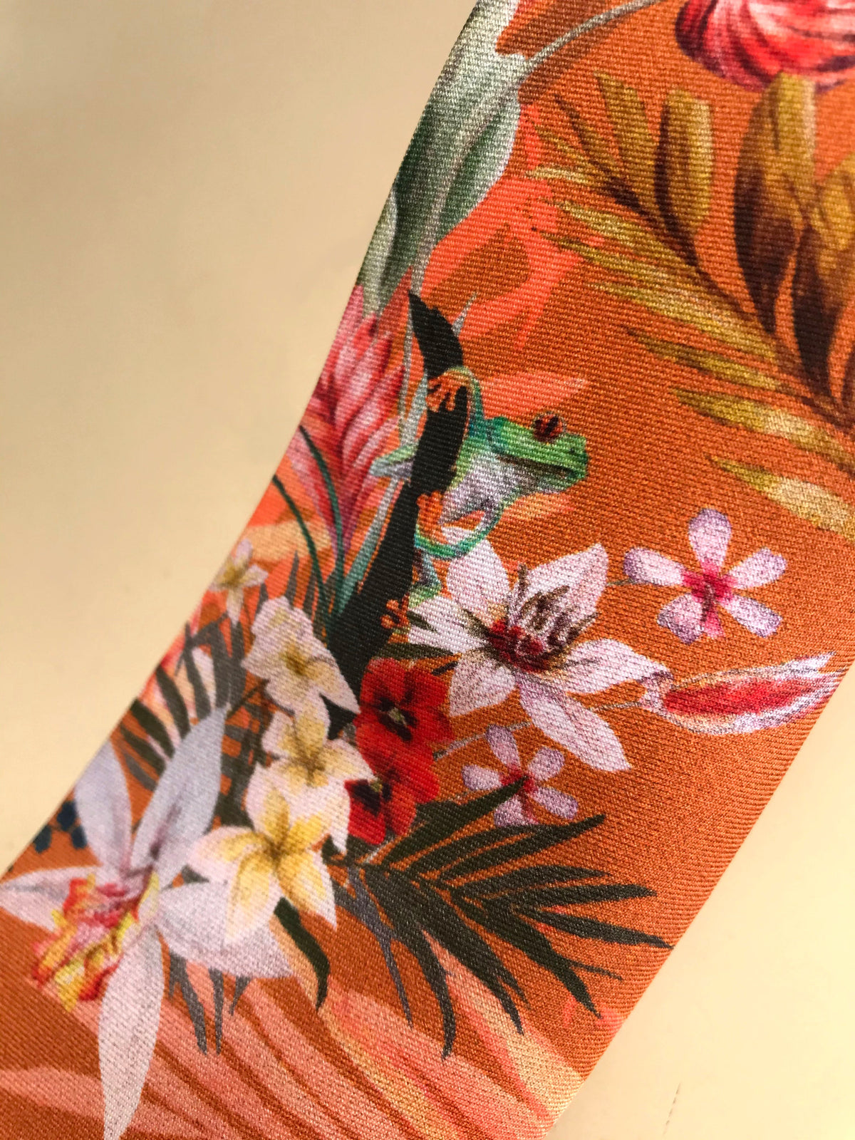 Rust orange coloured Silk Tie, 'Eden' tropical meadow print
