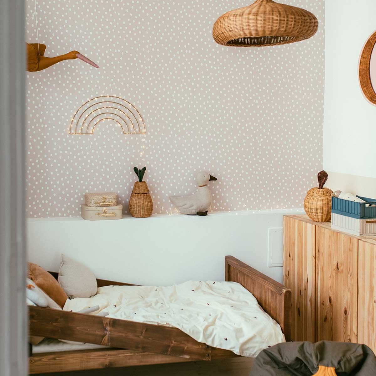 elegant powder pink and white irregular dot wallpaper in soft morning light