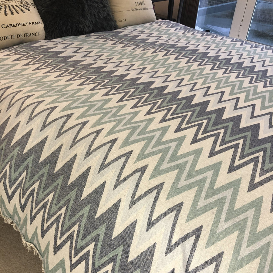 Luxury Sirocco organic cotton jacquard weave throw, oversized 200x250cm, soft muted zigzag pattern, elegant trim, premium bedspread or sofa blanket by Wildash London at brixbailey.com