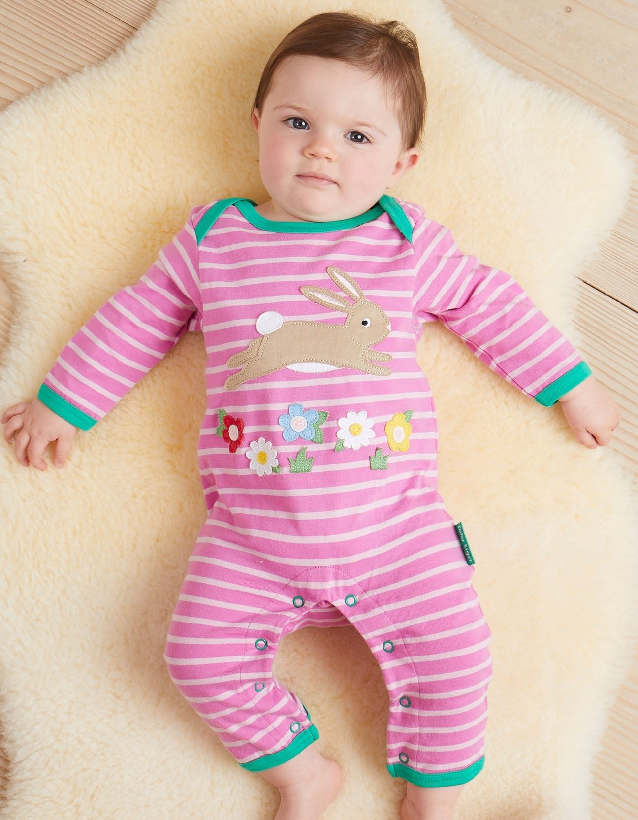 Premium Pink Striped Bunny Jumpsuit for Babies, GOTS Certified Organic Cotton Sleepsuit with Snap Buttons by Toby Tiger at brixbailey.com
