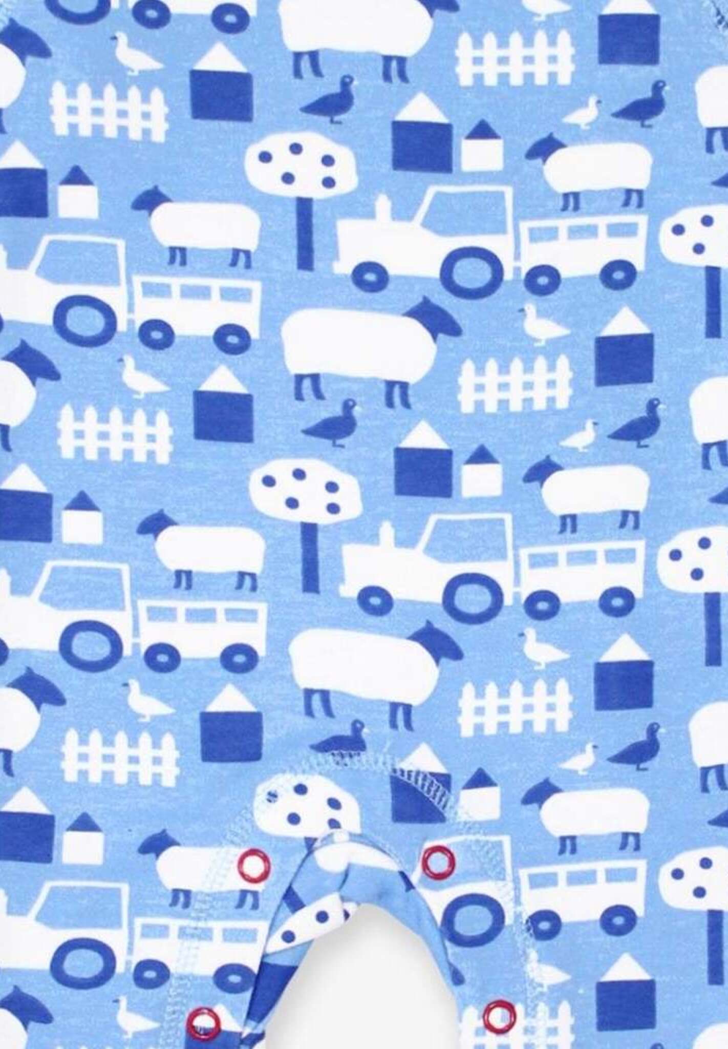 Premium organic cotton baby sleepwear with farm animal print, soft GOTS-certified fabric, snap-button legs, stylish Toby Tiger design by Toby Tiger at brixbailey.com
