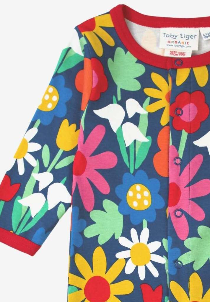 Premium Dark Blue Floral One-Piece with Snowdrops Daisies and Tulips - Soft Organic Cotton Baby Romper with Snap Buttons by Toby Tiger at brixbailey.com