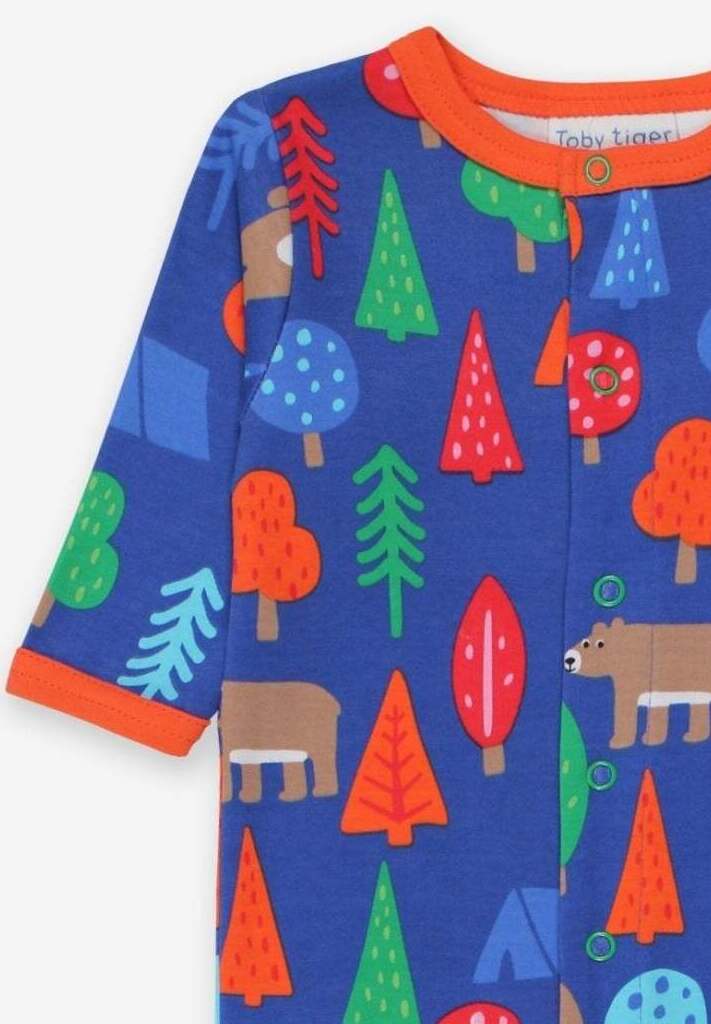Premium organic cotton pajamas with camping bear print, soft GOTS-certified fabric, slip-on neckline, snap buttons, stylish and comfortable by Toby Tiger at brixbailey.com