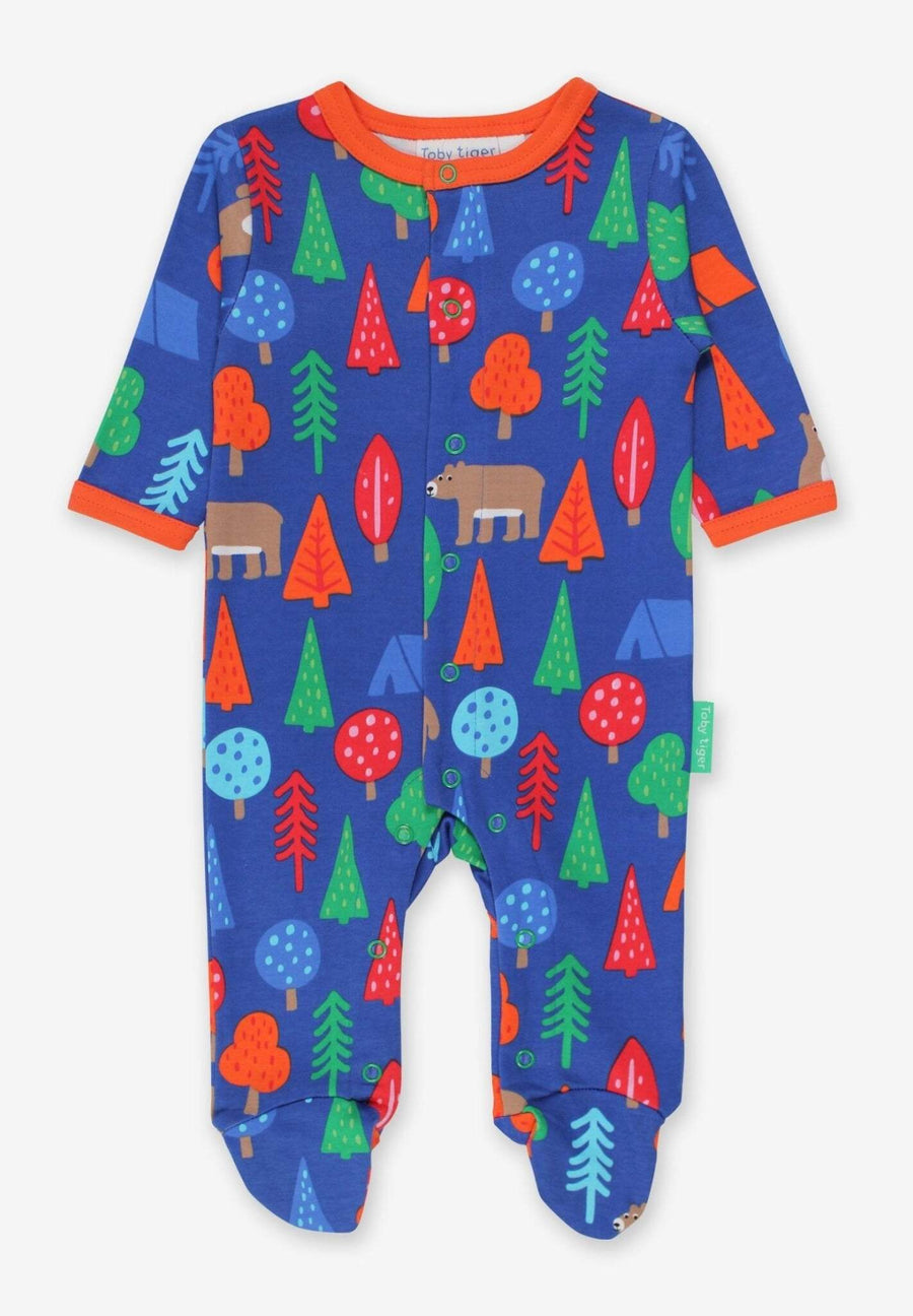 Premium organic cotton pajama set with camping bear print, soft GOTS certified fabric, slip-on neckline, snap buttons, eco-friendly dyes by Toby Tiger at brixbailey.com