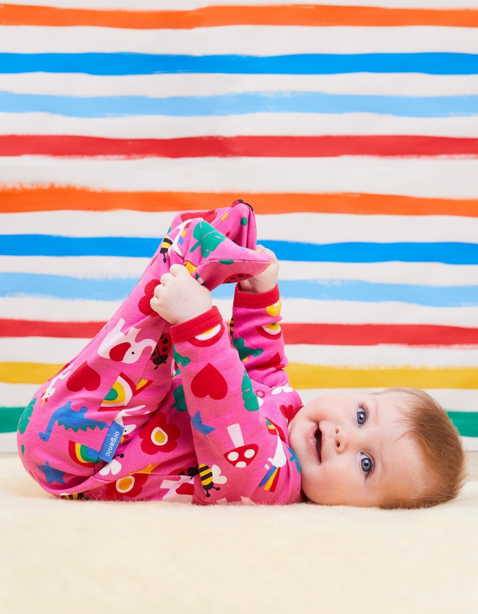 Cozy Dinosaur and Unicorn Sleepsuit for Babies in Premium Organic Cotton with Snap Buttons for Easy Diaper Changes by Toby Tiger at brixbailey.com