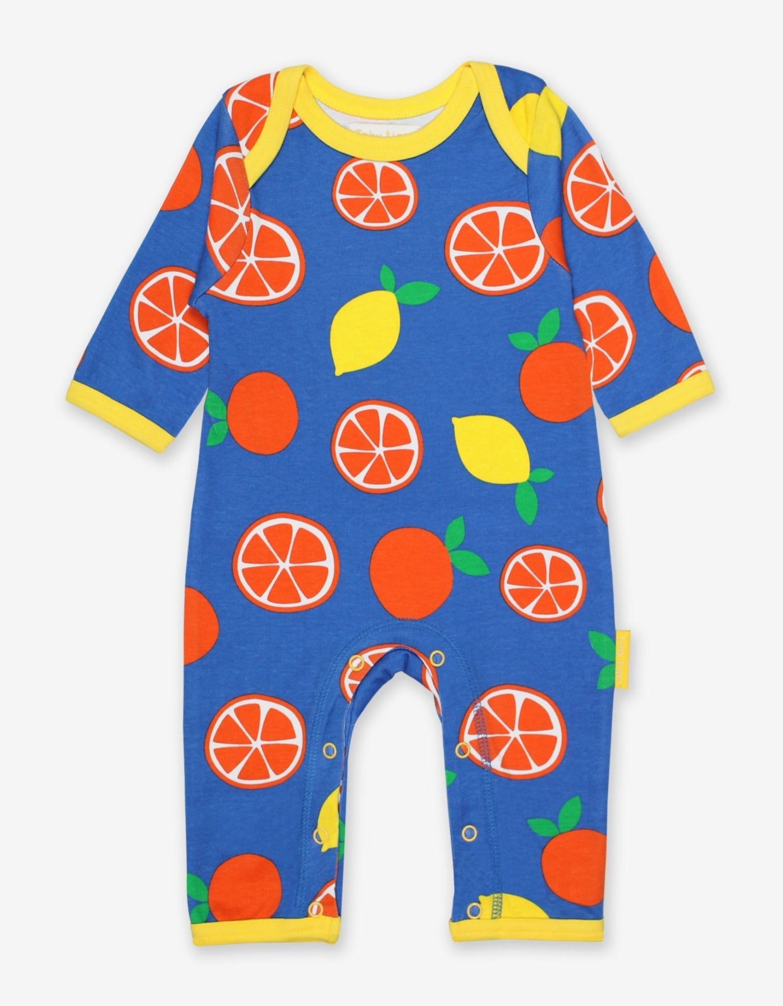 Premium organic cotton pajama set with citrus print, soft GOTS-certified fabric, slip-on design with snap buttons, stylish Toby Tiger pattern by Toby Tiger at brixbailey.com