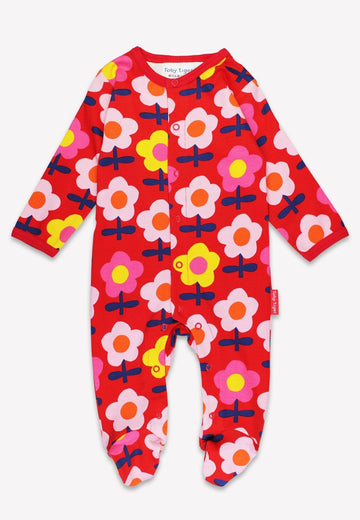 Luxury organic cotton baby romper with retro floral print, soft GOTS certified sleepwear, stylish and comfortable for day or night by Toby Tiger at brixbailey.com
