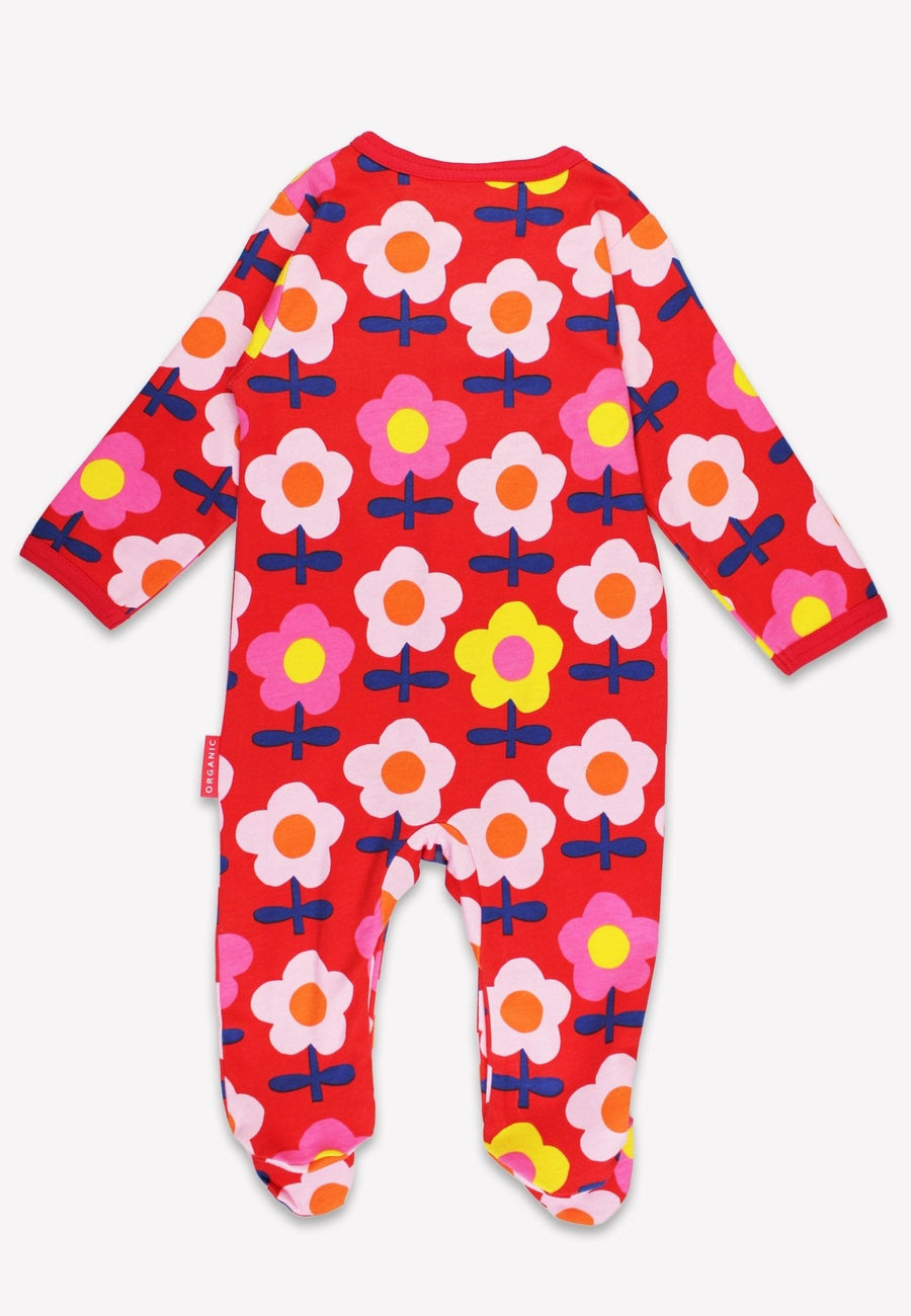 Luxury organic cotton baby romper with retro floral print, soft GOTS certified fabric, stylish and comfortable for sleep or play by Toby Tiger at brixbailey.com