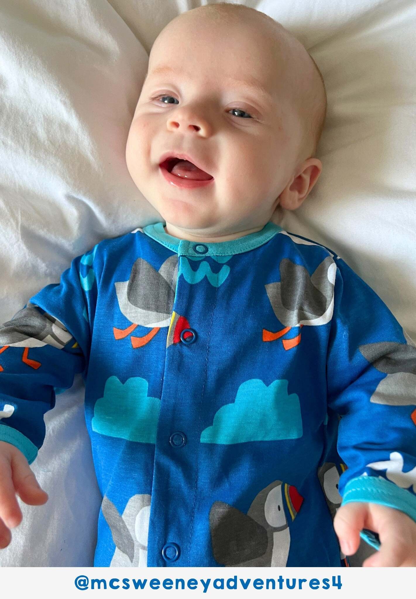 Adorable Toby Tiger Organic Sleepsuit for Kids with Sun and Waves Print by Toby Tiger at brixbailey.com
