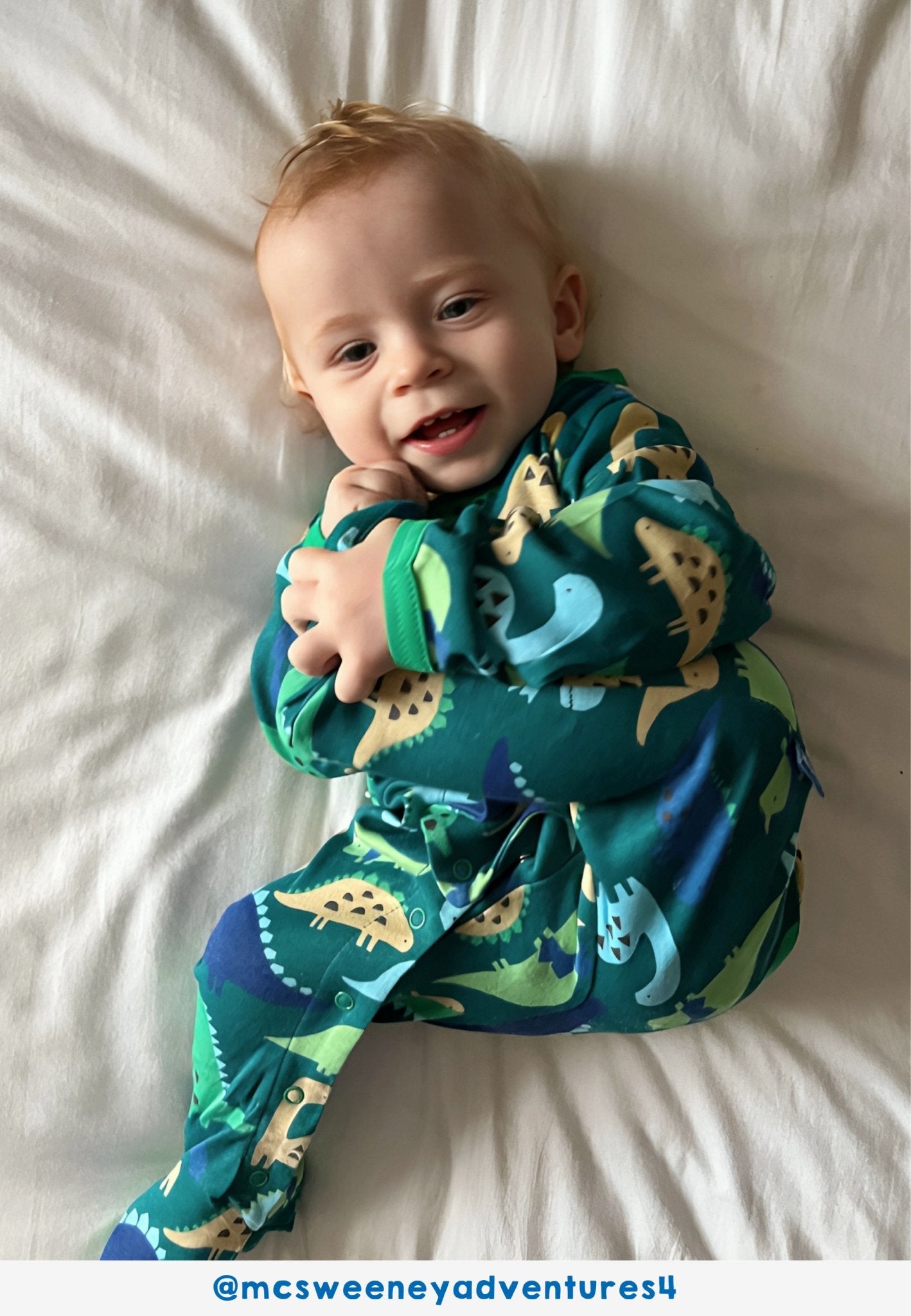 Premium Organic Cotton Dino Print Baby Romper with Feet for Cozy Sleep and Easy Diaper Changes by Toby Tiger at brixbailey.com
