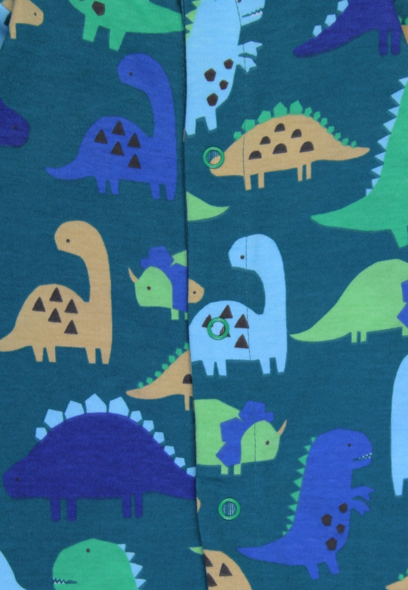 Cozy Dino Print Baby Footed Romper in Soft Organic Cotton for Relaxed Sleep by Toby Tiger at brixbailey.com