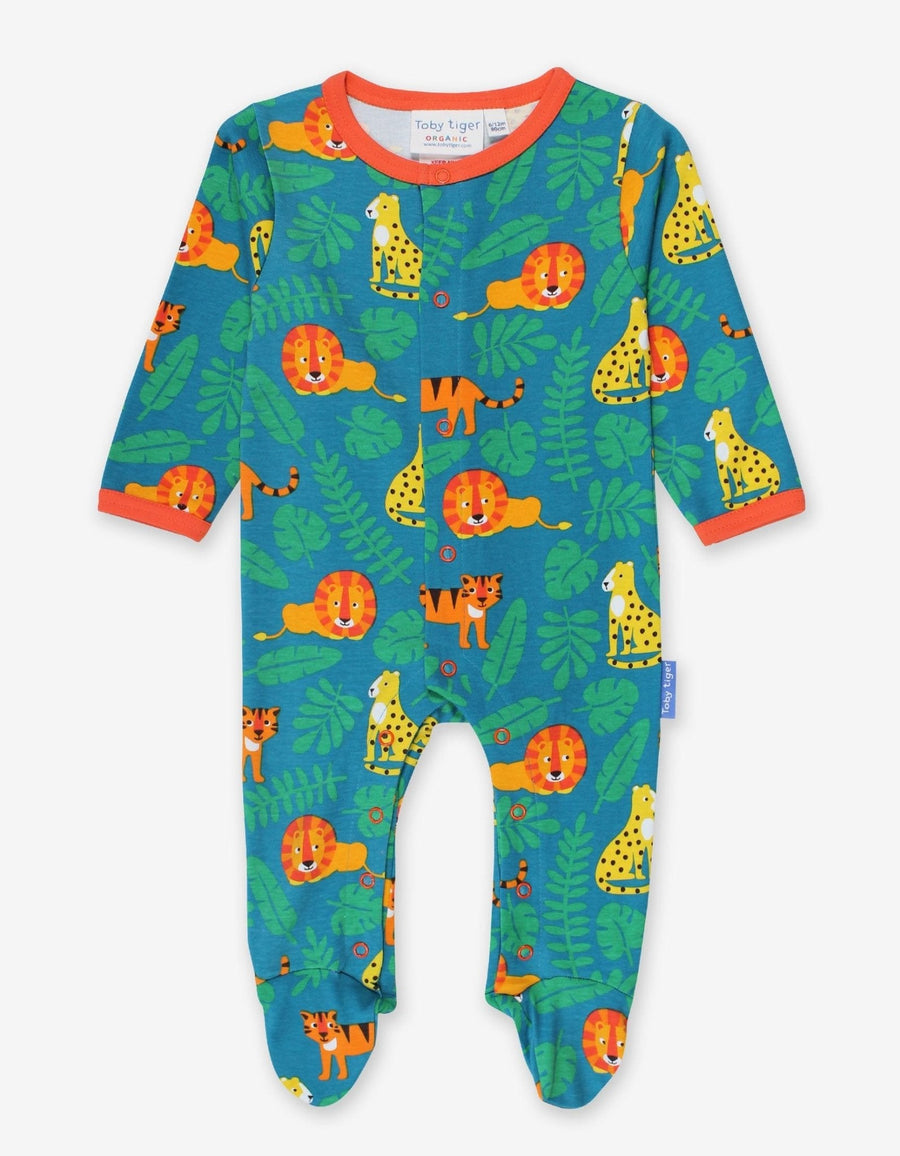 Premium baby sleepwear with lion print, 100% organic cotton, soft and comfortable, fully buttoned for easy diaper changes, GOTS certified by Toby Tiger at brixbailey.com