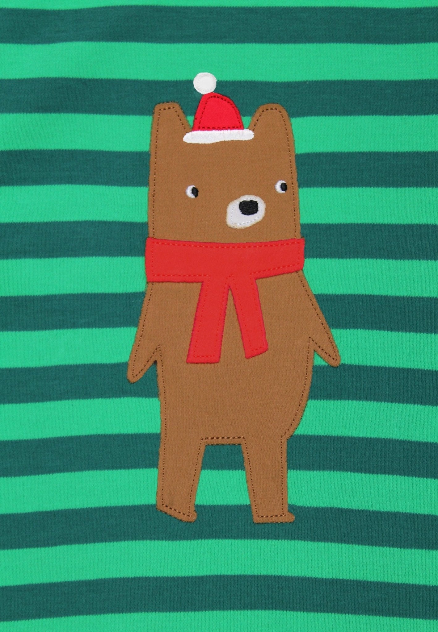Premium organic cotton baby Christmas romper with festive bear applique, soft footed pajamas for daytime or nighttime wear by Toby Tiger at brixbailey.com