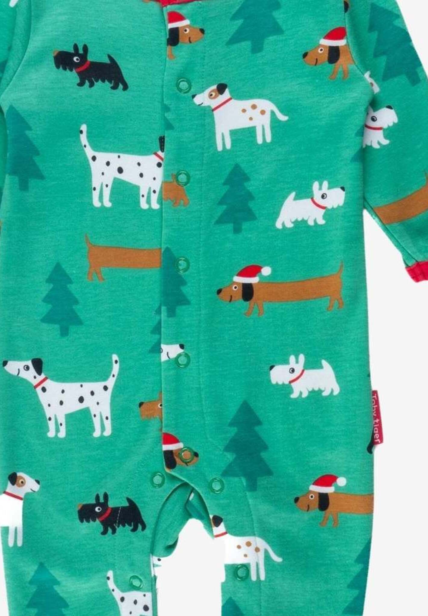 Premium organic cotton Christmas dog baby bodysuit with footies, snap buttons, cozy and stylish holiday pajamas by Toby Tiger at brixbailey.com