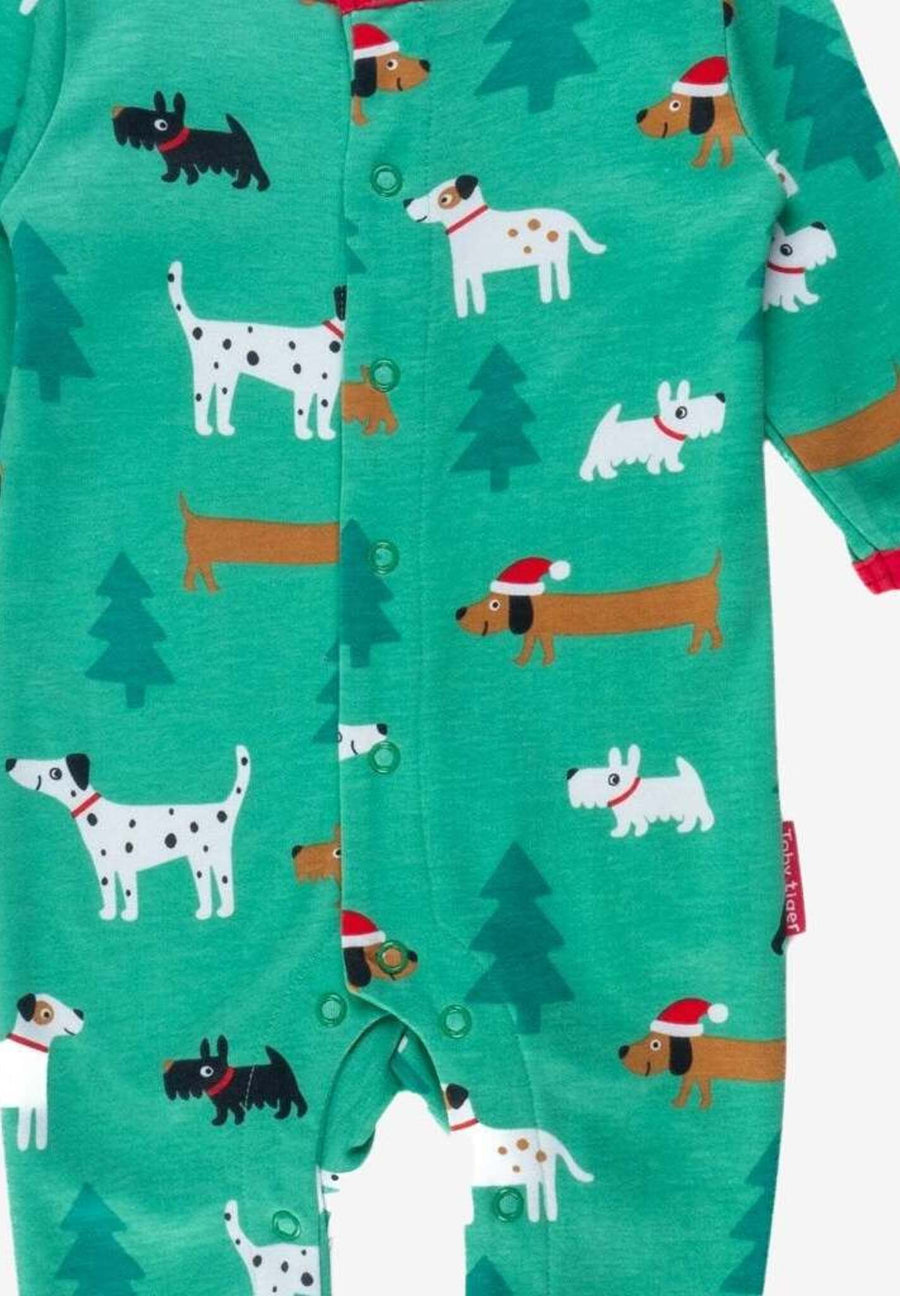 Premium organic cotton Christmas dog baby bodysuit with footies, snap buttons, cozy and stylish holiday pajamas by Toby Tiger at brixbailey.com
