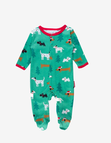 Premium organic cotton Christmas dog baby bodysuit with footies, snap closures, cozy and stylish holiday sleepwear by Toby Tiger at brixbailey.com