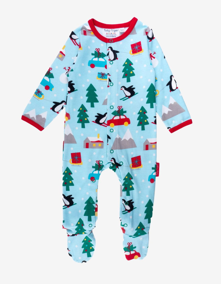 Premium GOTS Certified Organic Cotton Baby Christmas Pajamas with Penguin and Snowman Print, Snug Fit with Snap Buttons for Easy Diaper Changes by Toby Tiger at brixbailey.com