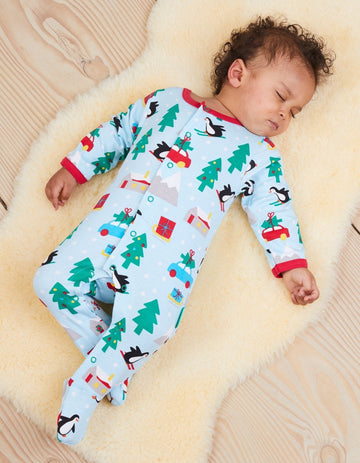 Premium GOTS Certified Organic Cotton Baby Christmas Pajamas with Penguin and Snowman Print, Easy Snap Closure, Cozy Footed Design by Toby Tiger at brixbailey.com