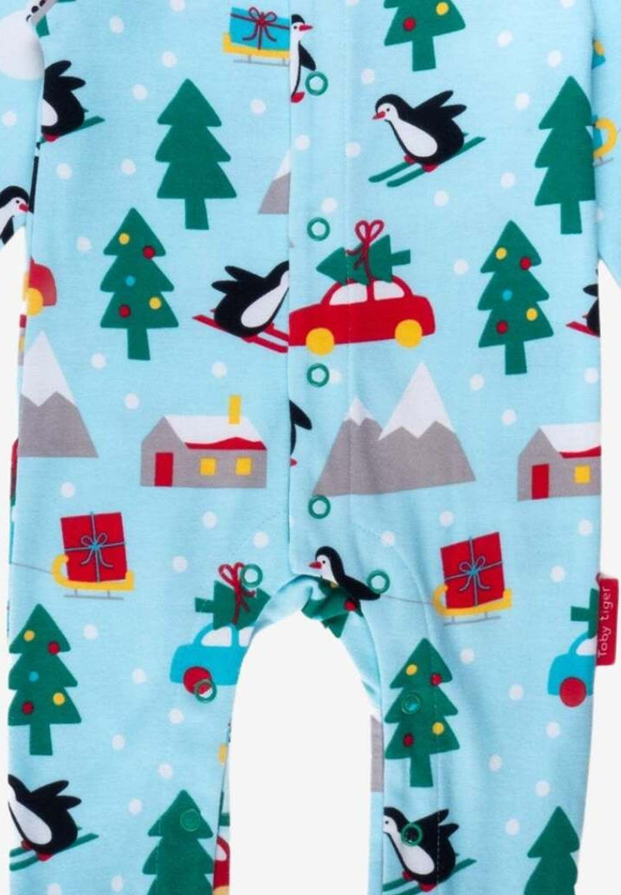 Baby's First Christmas GOTS Organic Cotton Pajama Set with Penguins and Snowmen, Snug Footed Romper for Cozy Holidays by Toby Tiger at brixbailey.com
