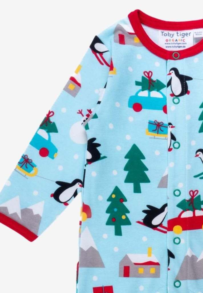 Premium GOTS Organic Cotton Baby Christmas Pajamas with Penguins and Snowmen, Snap Button Footie for Easy Diaper Changes by Toby Tiger at brixbailey.com
