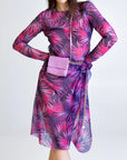 The SMARTTAN Pink Tropics Tan Through Sarong - Lightweight & UV Protective Beachwear by Smarttan at www.brixbailey.com