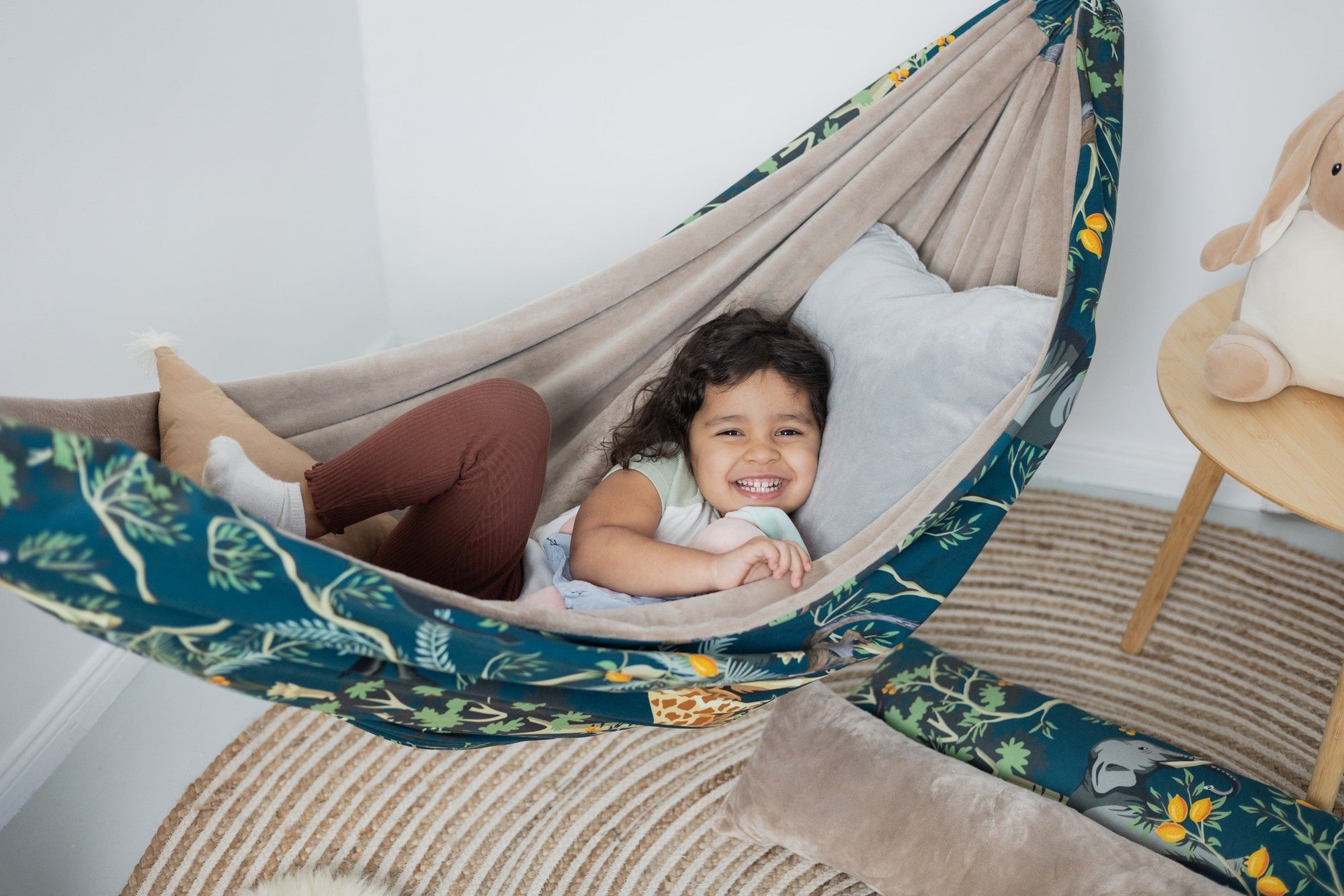 The Jungle Nap Hammock: Nature-Inspired Tropical Oasis for Family Relaxation - Handmade & Safe by Sówka at www.brixbailey.com