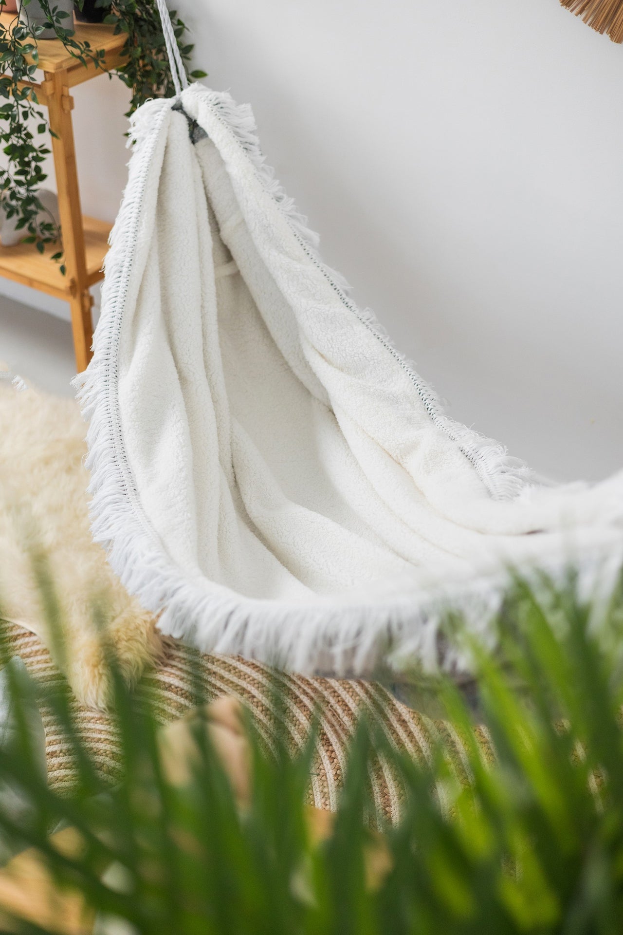 The Polar Hug Hammock - Cozy, Fluffy &amp; Kid-Safe Swing Chair for Dreamy Interiors by Sówka at www.brixbailey.com