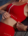 Embrace Comfort and Convenience with the Cute Cranberry Sports Bra by Peachlabel at www.brixbailey.com