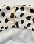 Long Sleeved Baby Bib - Spotty print