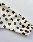 Long Sleeved Baby Bib - Spotty print