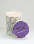 Luxury Solidarity soy candle with lilac buds, green leaves, cool earth scent, handcrafted premium fragrance, 60-hour burn time by Labyrinth Made Goods at brixbailey.com