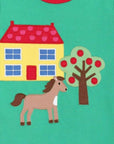 Premium Green Organic Cotton T-Shirt with Farmhouse Applique, Red Trim, and Snap Buttons for Easy Dressing by Toby Tiger at brixbailey.com
