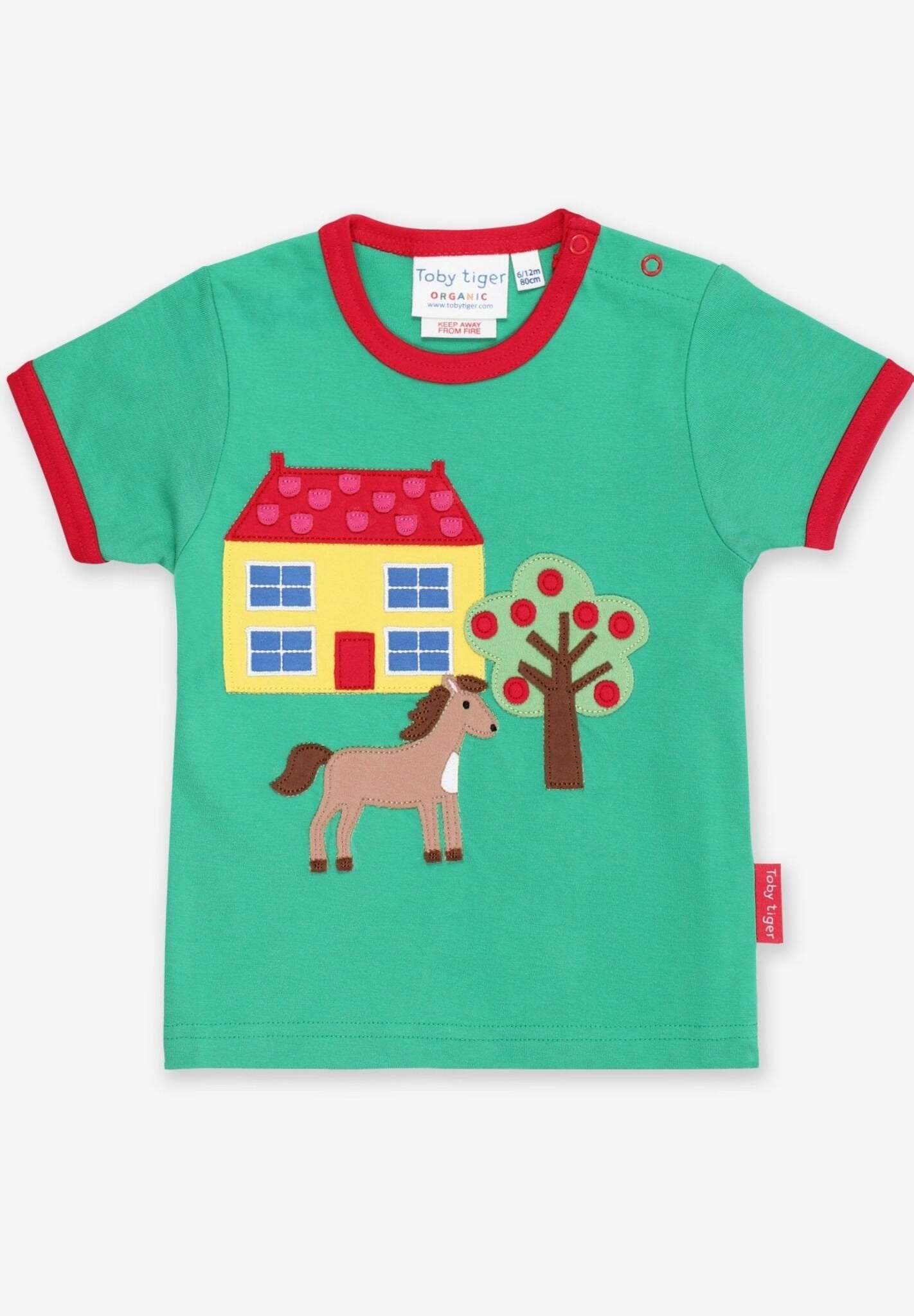 Premium Green Organic Cotton T-Shirt with Farmhouse Applique, Red Trim, and Snap Buttons for Easy Dressing by Toby Tiger at brixbailey.com