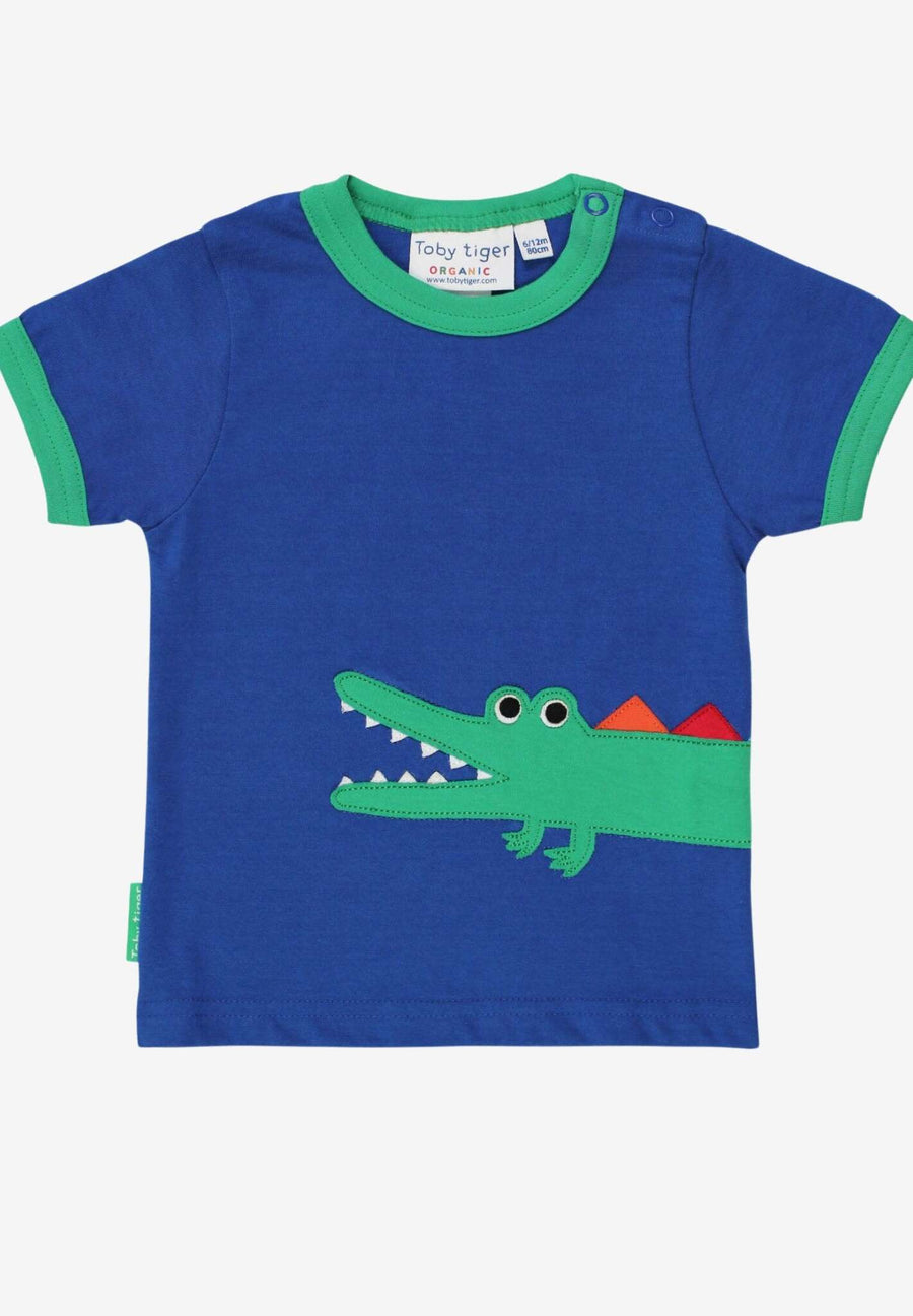 Premium baby crocodile applique t-shirt, soft organic cotton, rainbow details, snap button closure, sustainable toddler clothing, GOTS certified by Toby Tiger at brixbailey.com