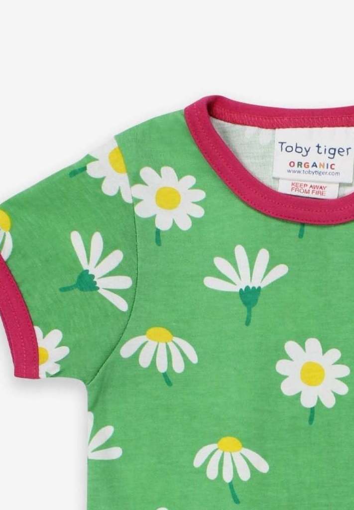 Premium baby daisy print short sleeve shirt, soft organic cotton, snap button closure, pink trim, eco-friendly dyes, machine washable by Toby Tiger at brixbailey.com
