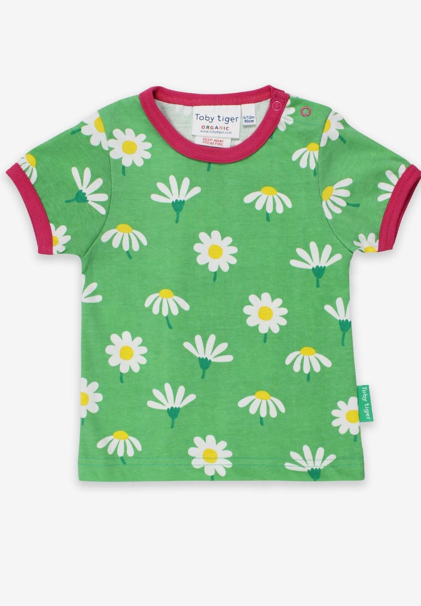 Premium baby daisy print organic cotton shirt, soft GOTS certified short sleeve tee with snap buttons, pink trim, sizes 3-24 months by Toby Tiger at brixbailey.com