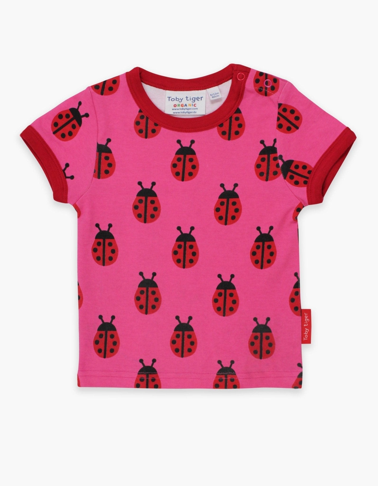 Premium Pink Ladybug Print Baby T-Shirt with Red Trim, Snap Closure, 100% GOTS Organic Cotton, Eco-Friendly Dyes by Toby Tiger at brixbailey.com