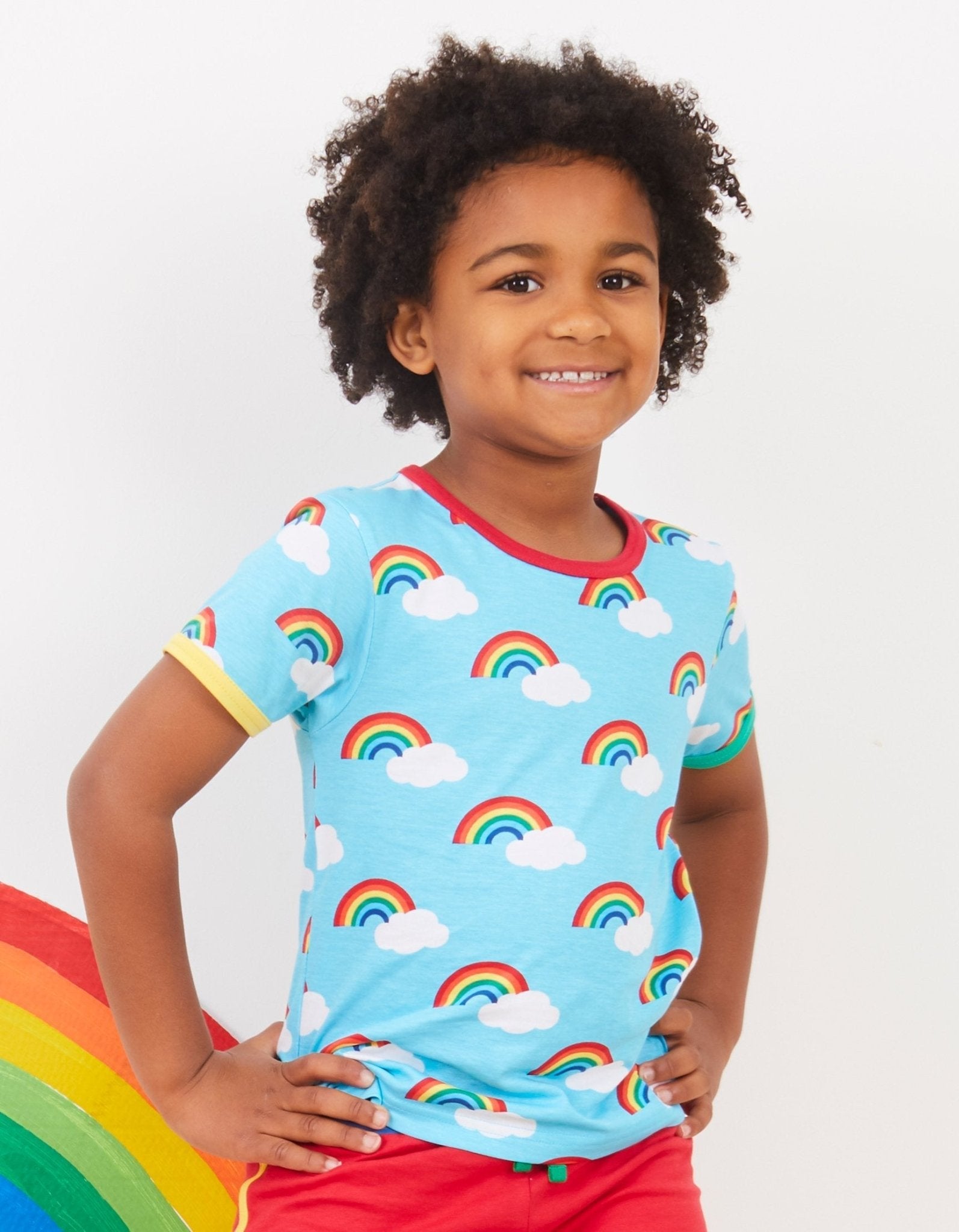 Premium turquoise rainbow print organic cotton kids t-shirt, soft GOTS certified, stylish colorful trim, snap buttons for infants by Toby Tiger at brixbailey.com
