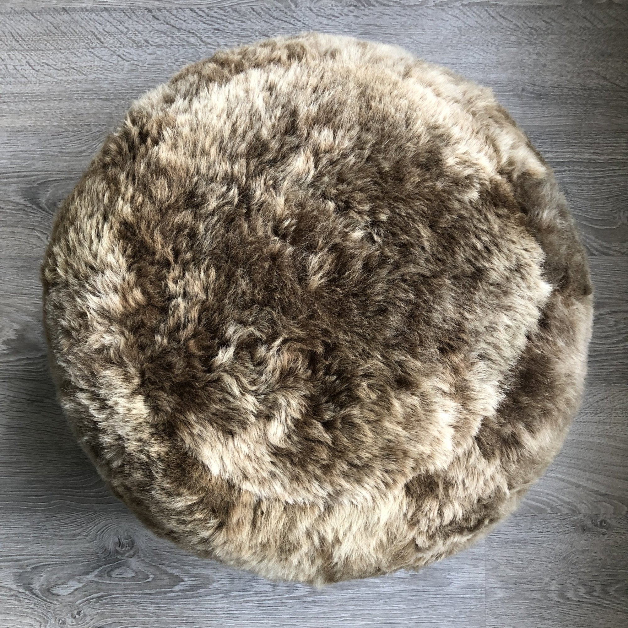 Luxury Icelandic sheepskin pouffe, handcrafted 50mm shorn grey boule, premium natural footstool or boudoir seat, stylish and hypoallergenic by Wildash London at brixbailey.com