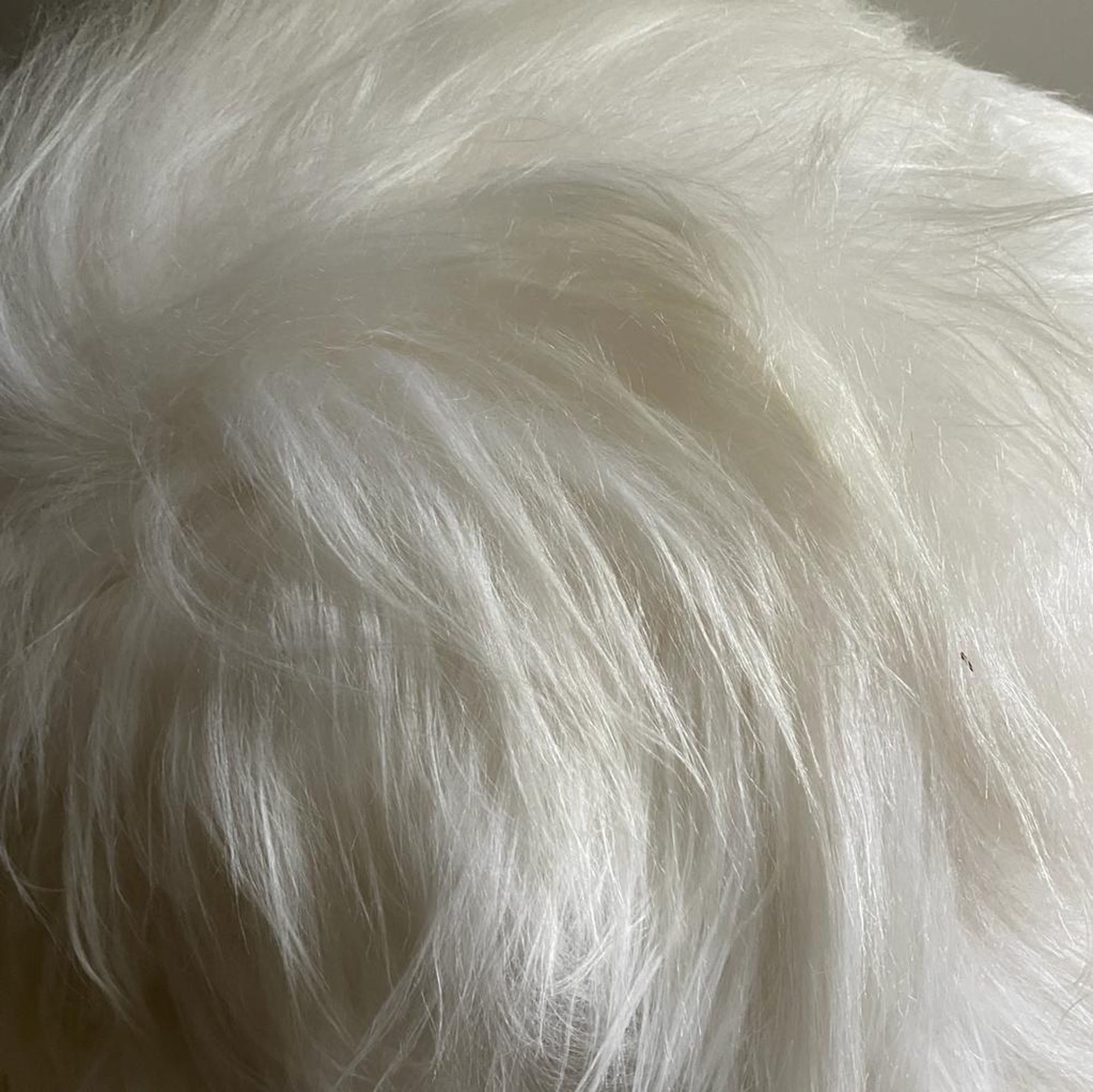 Luxury Icelandic sheepskin pouffe, long fur boule footstool in cool grey, stylish and practical for living room or bedroom by Wildash London at brixbailey.com