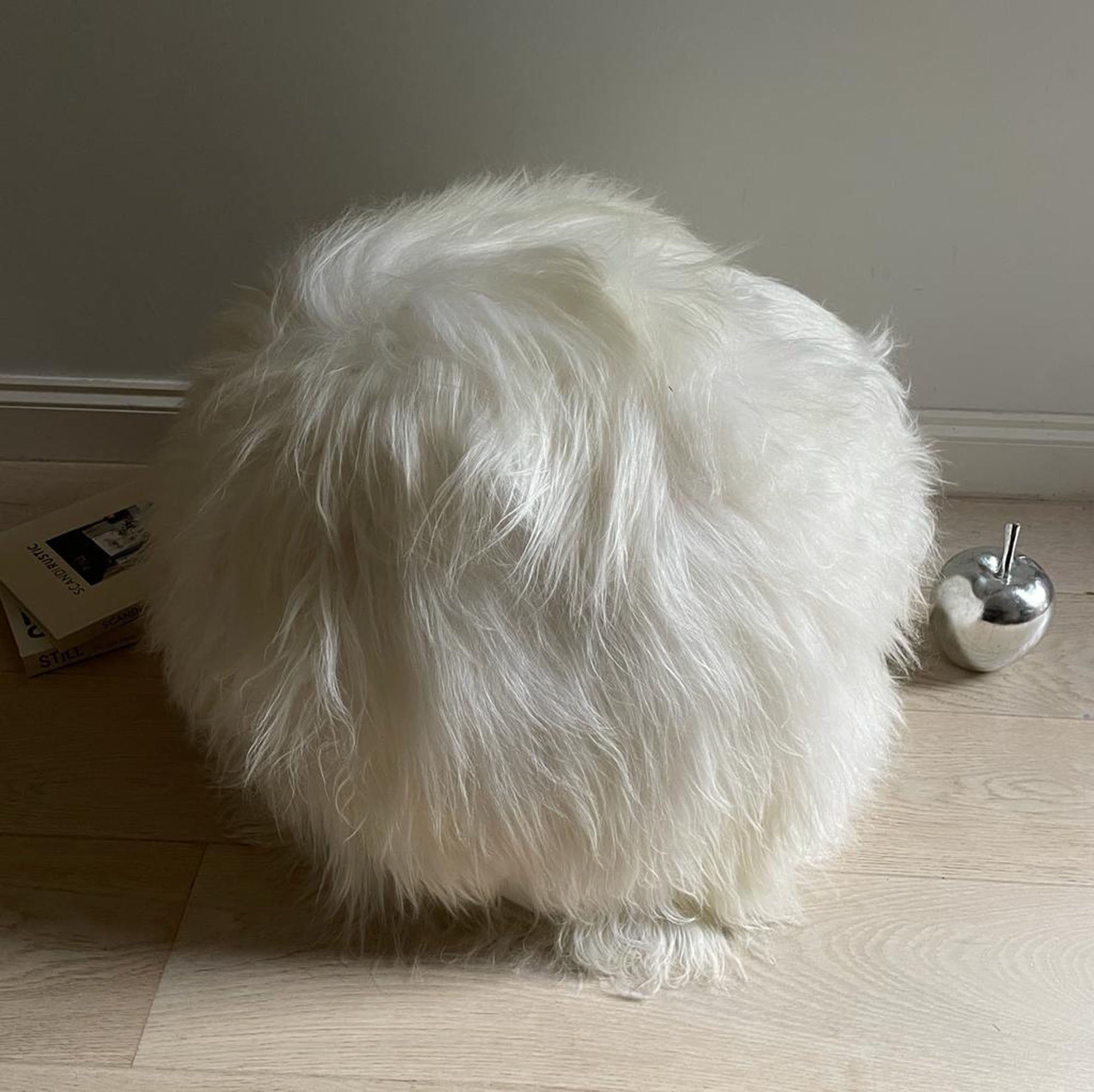 Luxury Icelandic sheepskin pouffe, elegant long fur boule footstool, stylish cool grey home decor by Wildash London at brixbailey.com