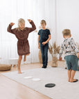 Tipi Stepping Stones - Enhance Coordination & Family Fun with Natural or Grey Wood Sets by Ette Tete at www.brixbailey.com