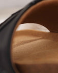 Premium black vegan sandals YIN, comfortable straps, soft footbed, slip-resistant sole, timeless capsule wardrobe essential by Fünve at brixbailey.com