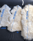 Premium British white sheepskin rug, large eco-tanned sustainable luxury throw, best-selling velvety fleece for home decor by Wildash London at brixbailey.com