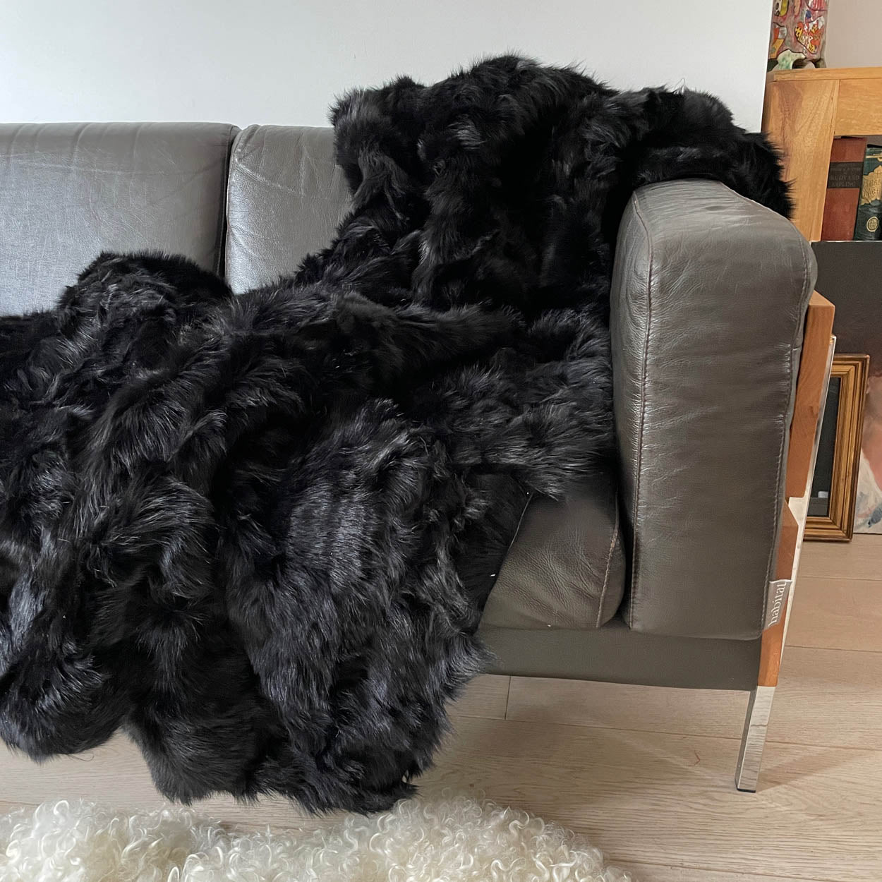 Luxury obsidian black shearling throw, premium Tuscan sheepskin rug or super king bed throw, handcrafted and sustainable by Wildash London at brixbailey.com