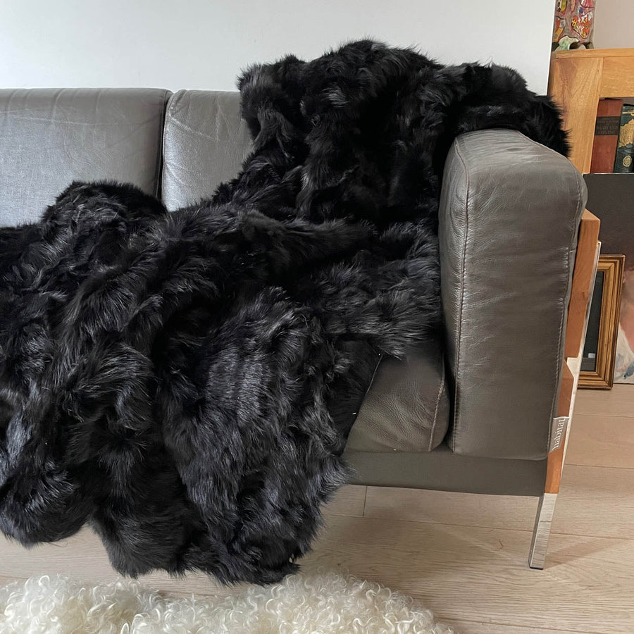 Luxury obsidian black shearling throw, premium Tuscan sheepskin rug or super king bed throw, handcrafted and sustainable by Wildash London at brixbailey.com