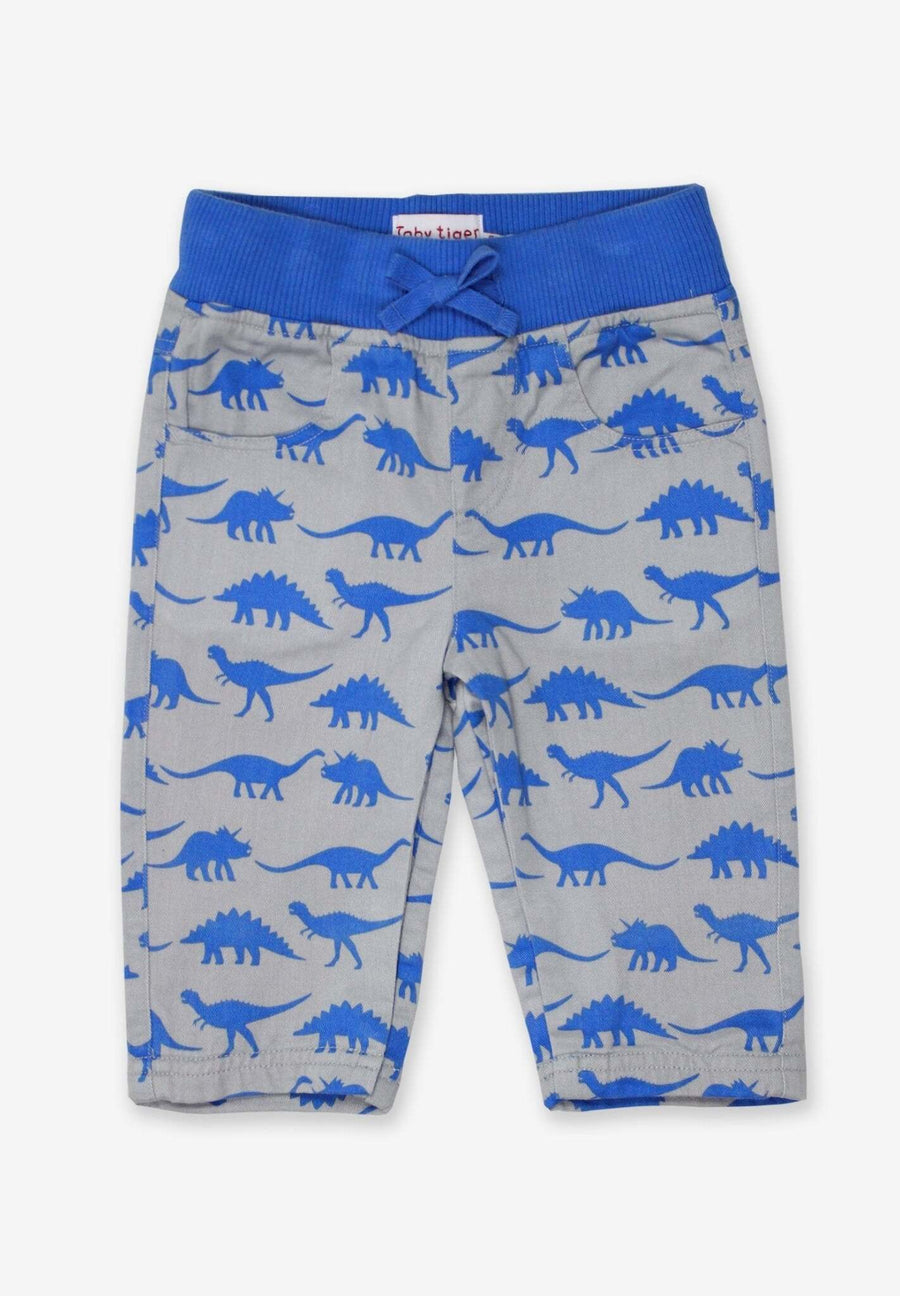 Premium baby cotton pants with playful dinosaur print, soft elastic waistband, cozy jersey lining, machine washable by Toby Tiger at brixbailey.com