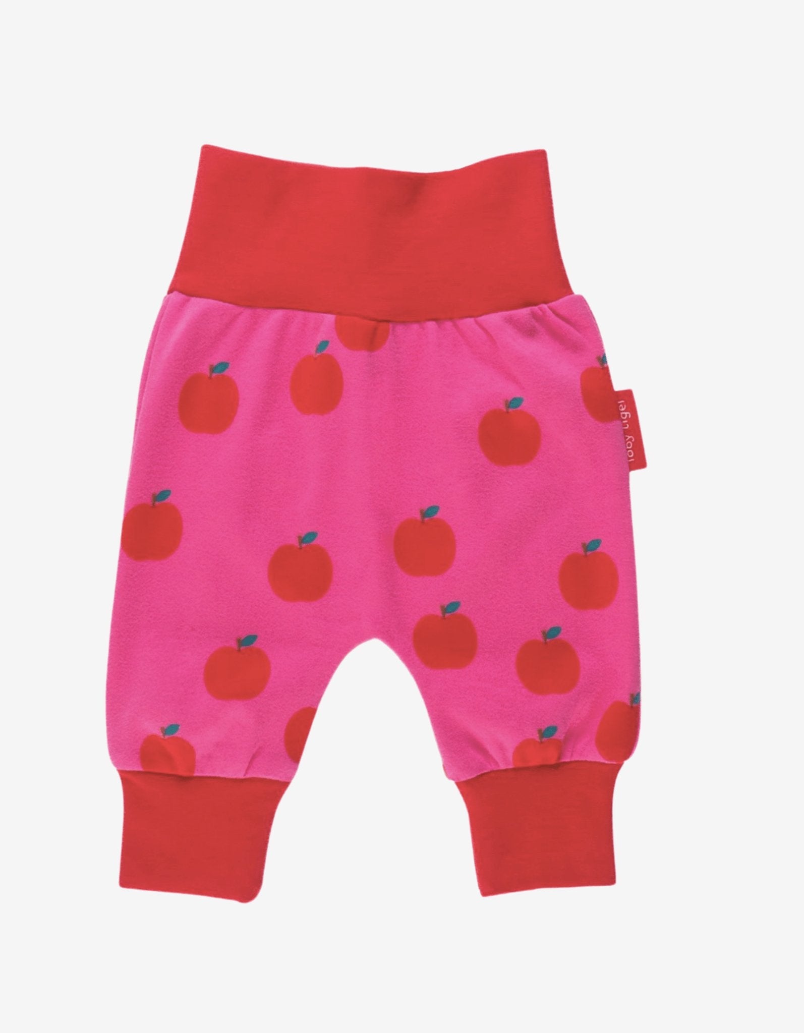 Luxury organic cotton kids yoga pants with apple print, stylish red and pink contrast trim, soft GOTS certified fabric by Toby Tiger at brixbailey.com